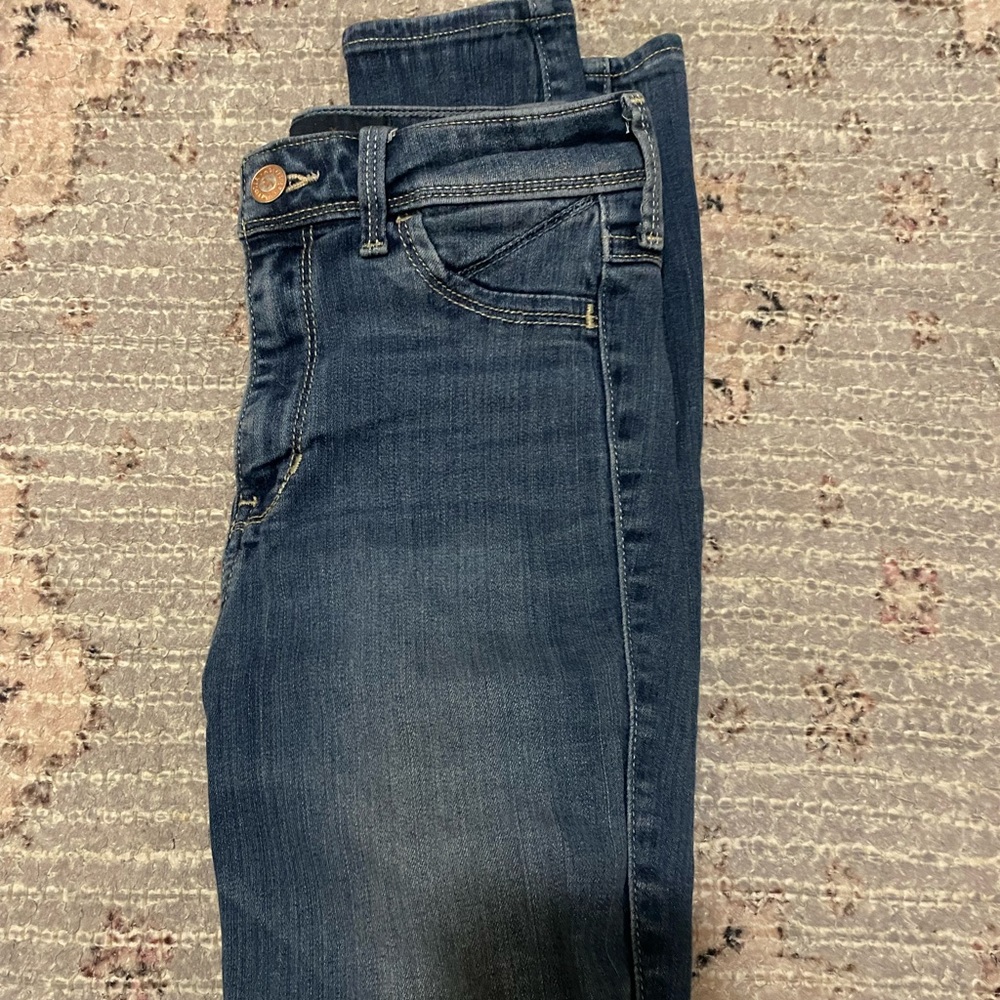 Hollister Size 1 Jeans. Skinny. Have holes in the knee area. Not many though.